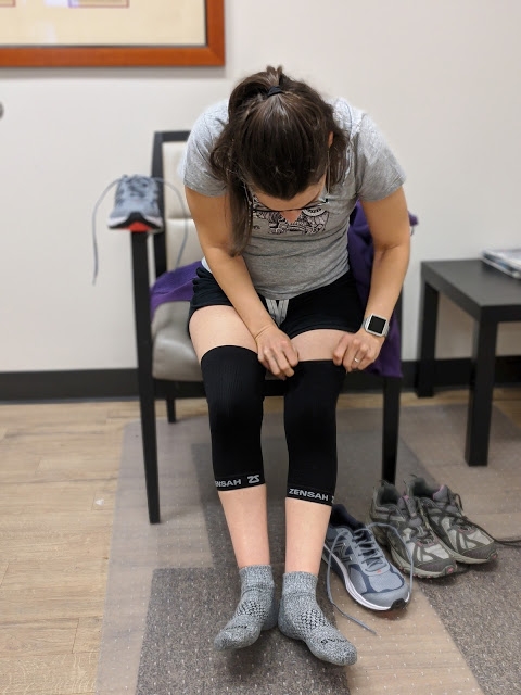 Putting on knee sleeves 